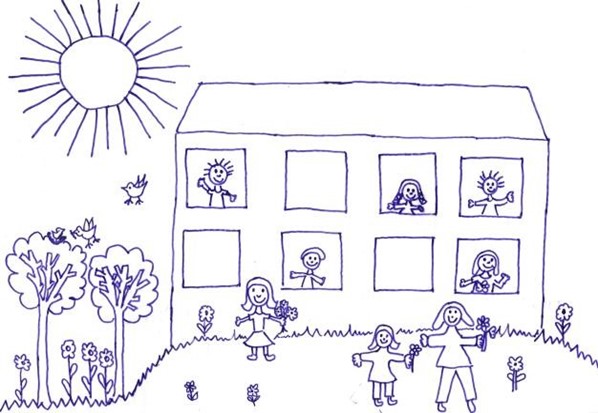 Schulhaus mit fröhlichen Kindern auf einer Wiese